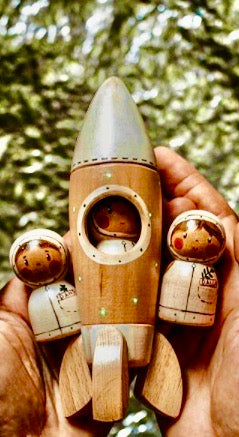 Gnezdo Rocketship with Astronaut toy