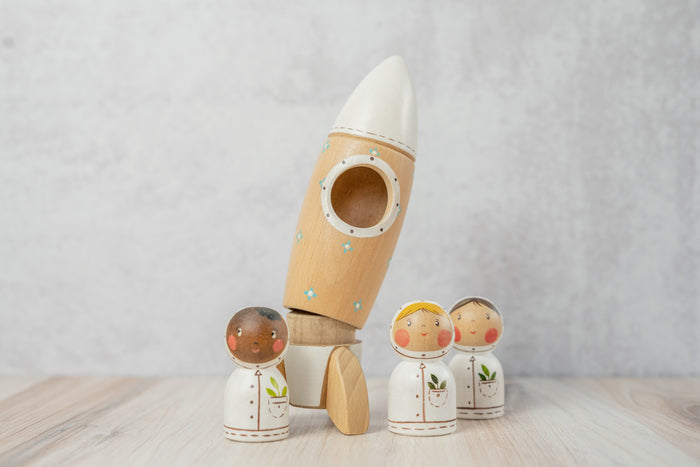 Gnezdo Rocketship with Astronaut toy