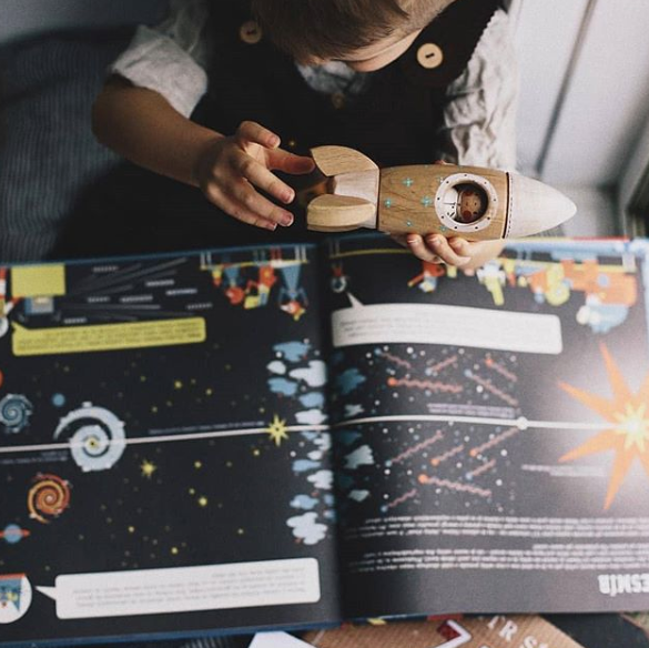 Gnezdo Rocketship with Astronaut toy