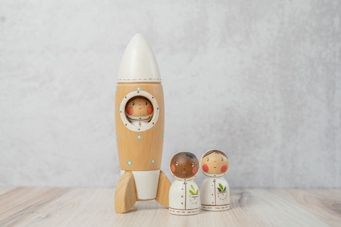 Gnezdo Rocketship with Astronaut toy