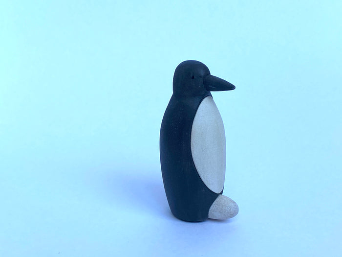 Wooden Penguin Figurine with an Egg