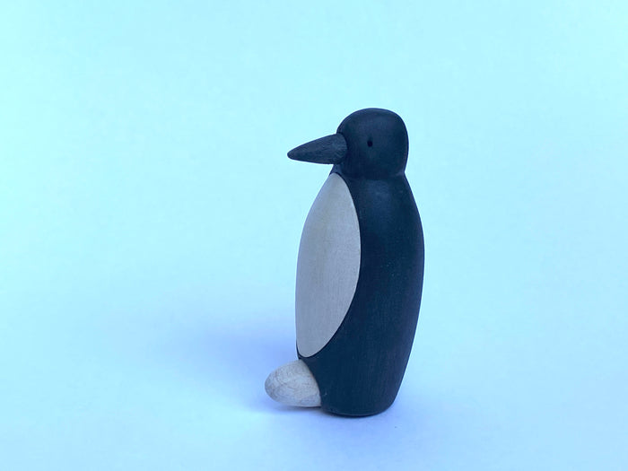 Wooden Penguin Figurine with an Egg