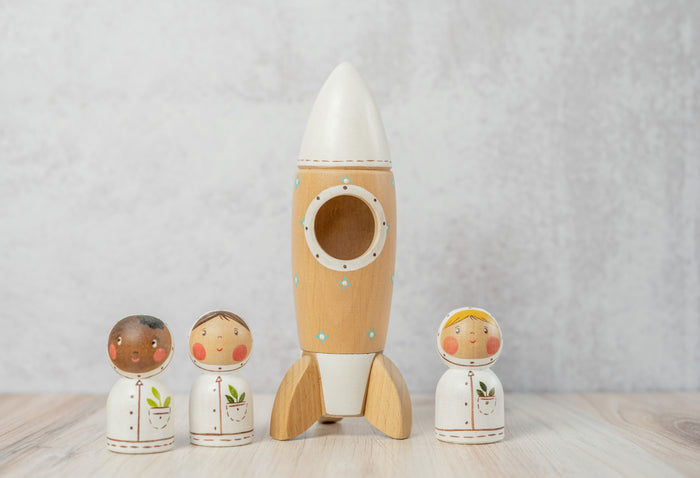 Gnezdo Rocketship with Astronaut toy